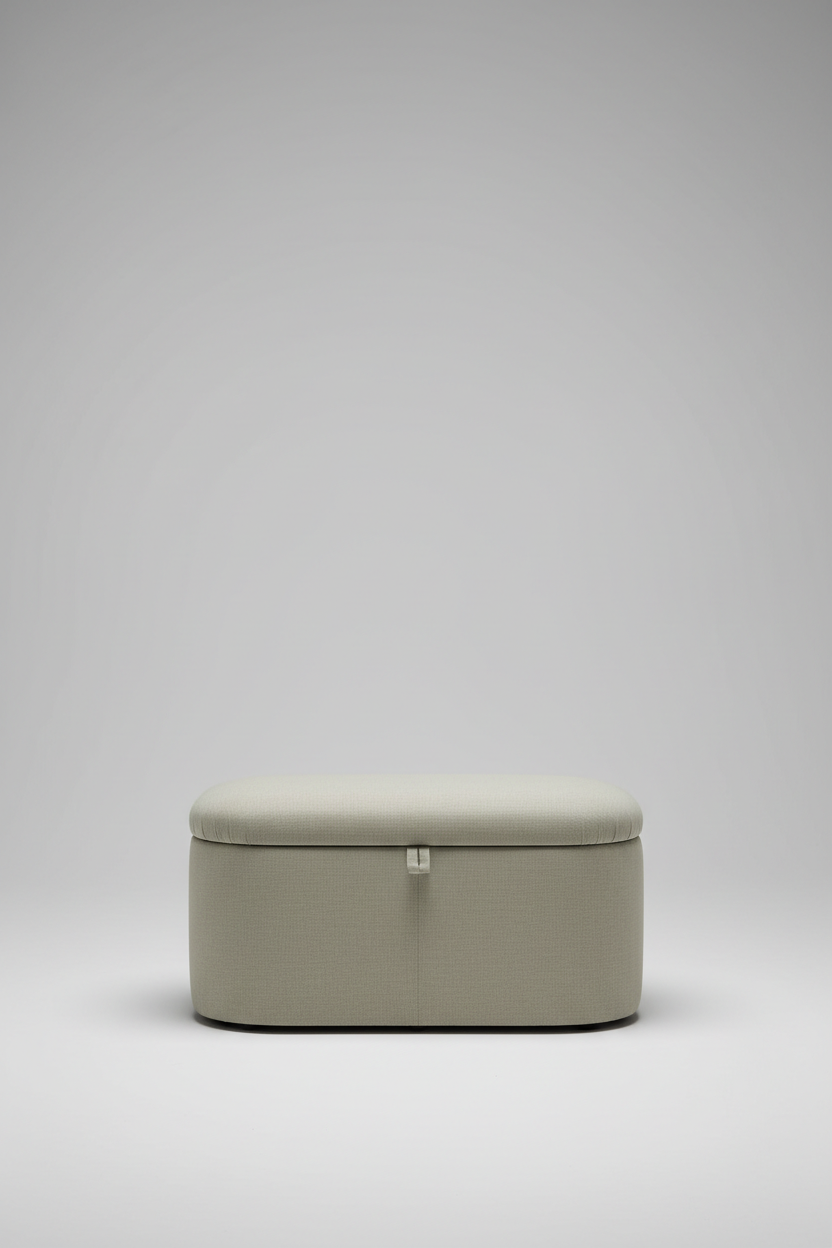 Oval linen storage ottoman in soft sage beige, hero shot on light grey background
