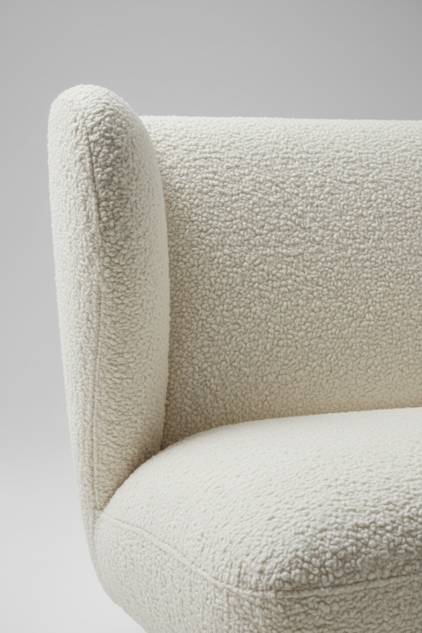 Bouclé upholstery close-up on Wing Lounge Chair in Ivory Cream